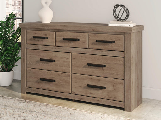 Garistyn Light Brown Seven Drawer Dresser