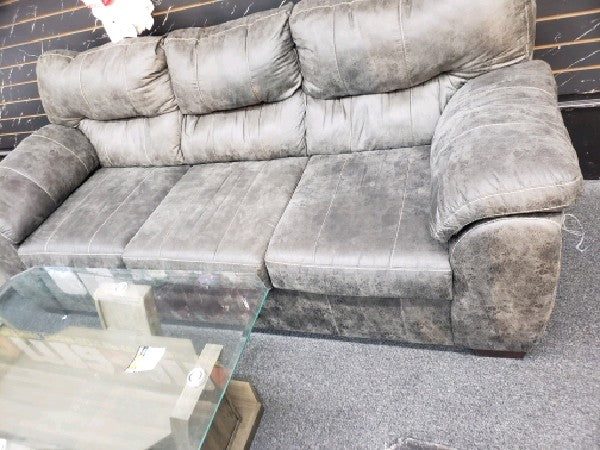 2 brown couches and glass coffee table - new