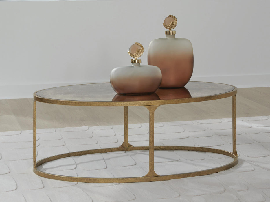 Korajane Antique Gold Oval Cocktail Table