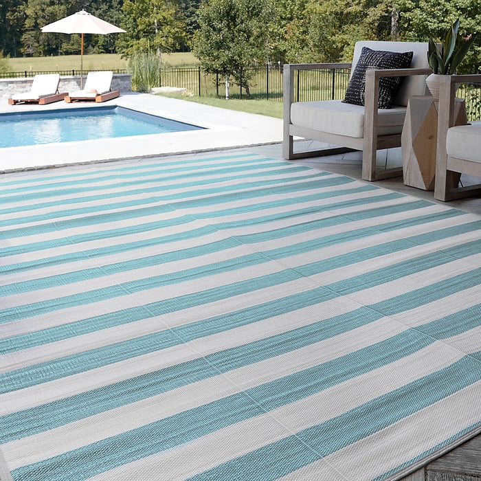 Tayse Luna 7 x 10 (ft) Flatweave Aqua Rectangular Outdoor Pet Friendly Area rug - new