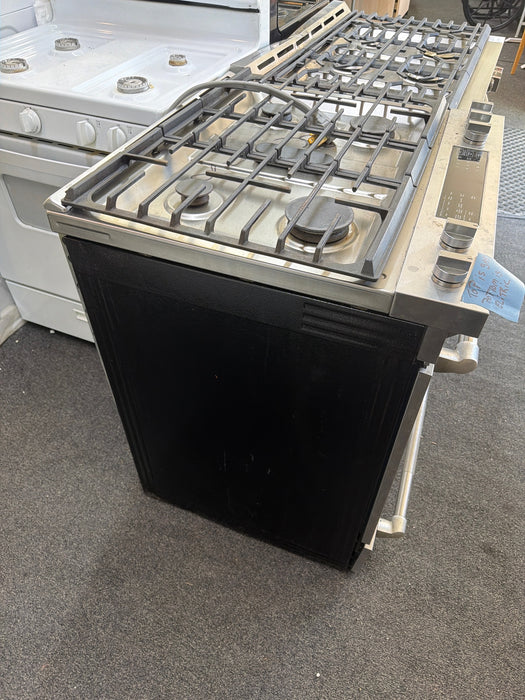 JennAir  30 Inch Slide-In Dual Fuel Range with 4 Sealed Burners, 6.2 cu. ft. Oven Capacity, Continuous Grates, Self-Clean Mode, Downdraft Ventilation, and True Convection: Stainless Steel - used_good