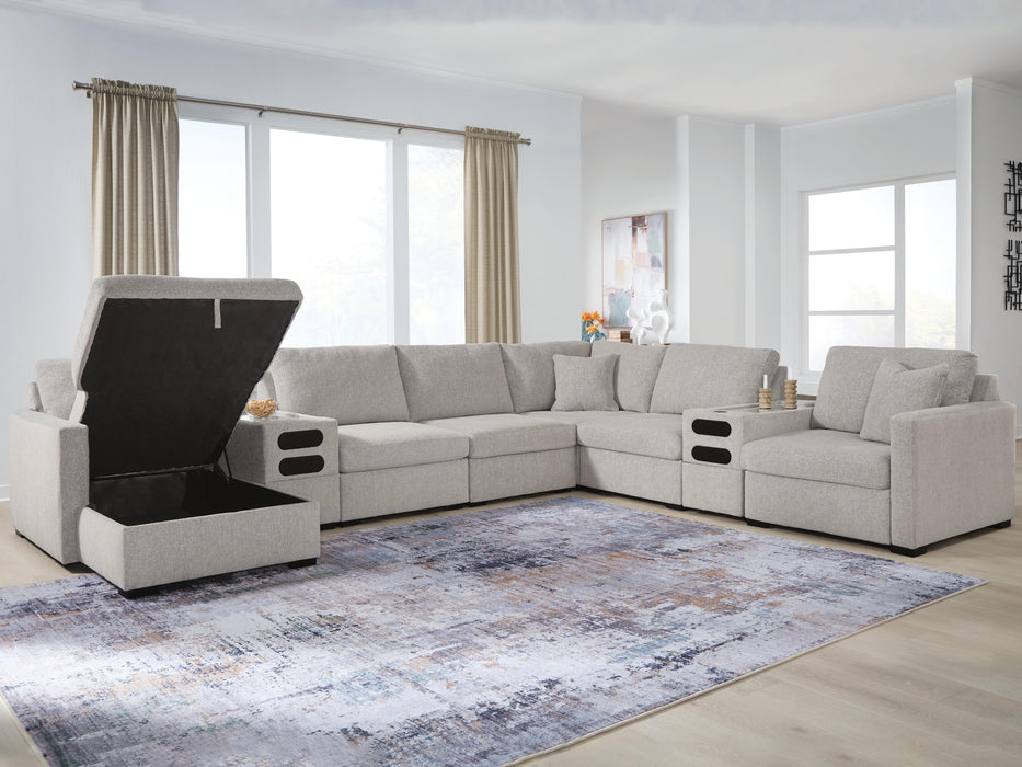 Benchcraft Flint 8-Piece Sectional with Storage Chaise and Audio Consoles