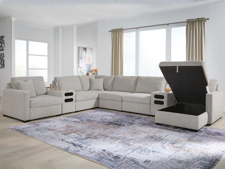 Benchcraft Flint 8-Piece Sectional with Storage Chaise and Audio Consoles