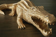 Signature Design Antique Gold Finish Sculpture