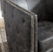 Signature Design Distressed Black Swivel Accent Chair