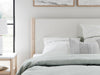 Signature Design Two-tone Queen Upholstered Panel Bed