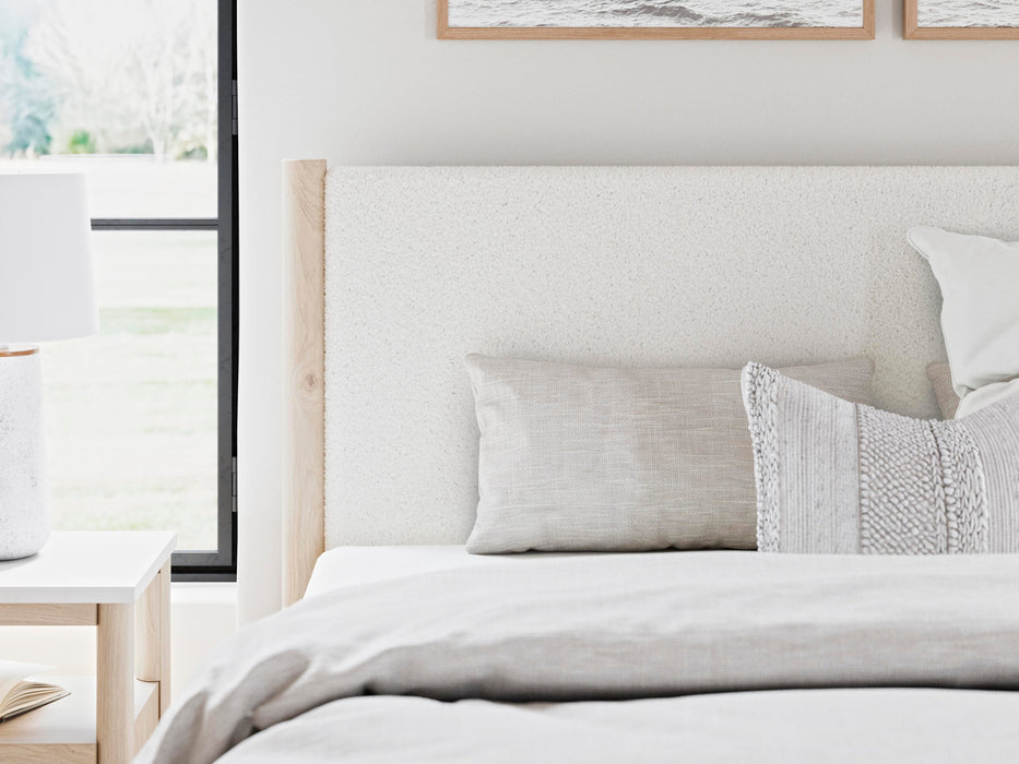 Signature Design Two-tone King Upholstered Panel Bed