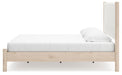 Signature Design Two-tone King Upholstered Panel Bed