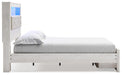 Signature Design White Queen Upholstered Bookcase Bed with Storage