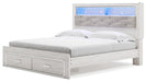 Signature Design White King Upholstered Bookcase Bed with Storage