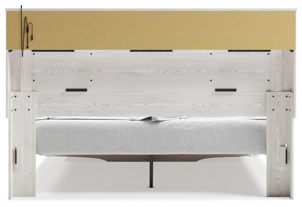 Signature Design White King Upholstered Bookcase Bed with Storage