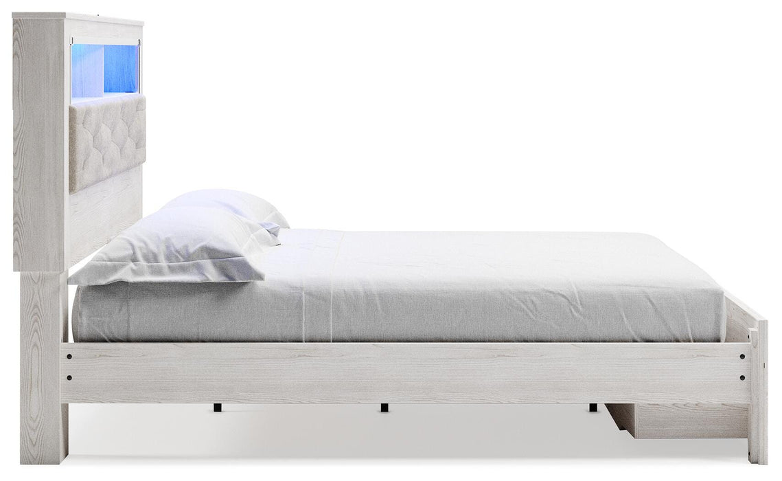 Signature Design White King Upholstered Bookcase Bed with Storage