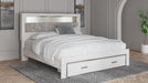 Signature Design White King Upholstered Bookcase Bed with Storage
