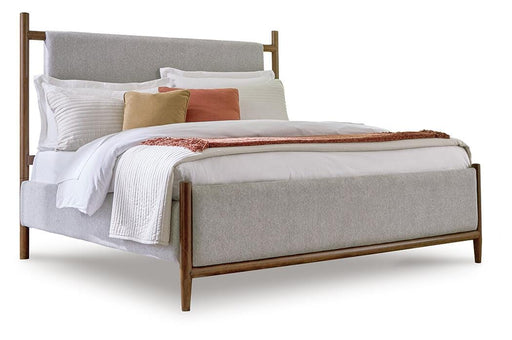 Signature Design Brown Queen Upholstered Panel Bed