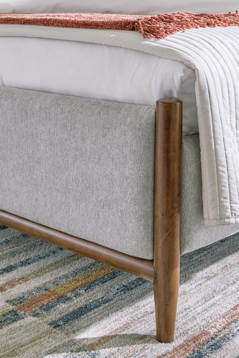 Signature Design Brown Queen Upholstered Panel Bed