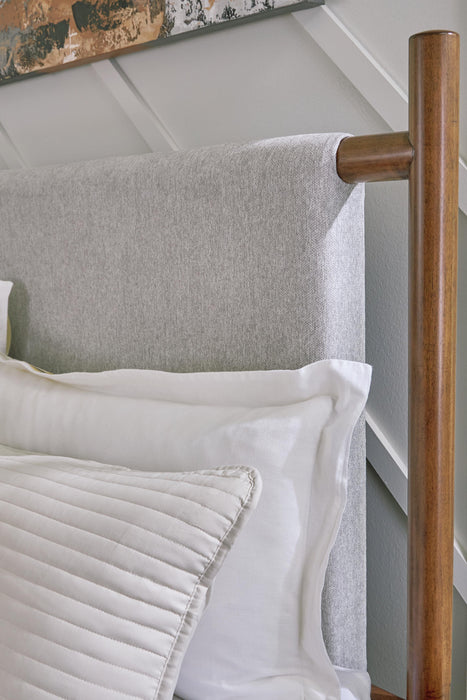 Signature Design Brown Queen Upholstered Panel Bed
