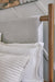 Signature Design Brown Queen Upholstered Panel Bed