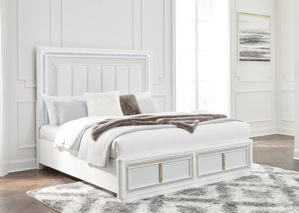 Signature Design White California King Upholstered Storage Bed