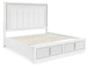 Signature Design White California King Upholstered Storage Bed