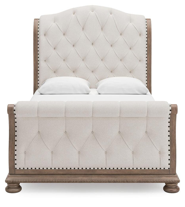 Signature Design Light Brown Queen Upholstered Sleigh Bed