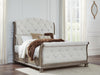Signature Design Light Brown Queen Upholstered Sleigh Bed