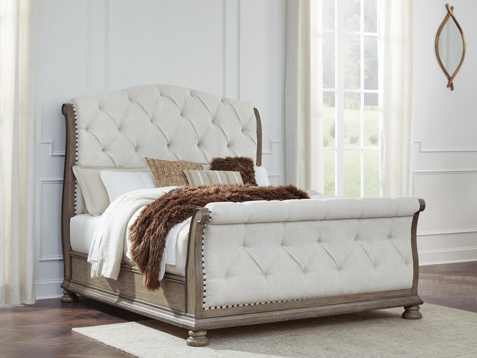 Signature Design Light Brown Queen Upholstered Sleigh Bed