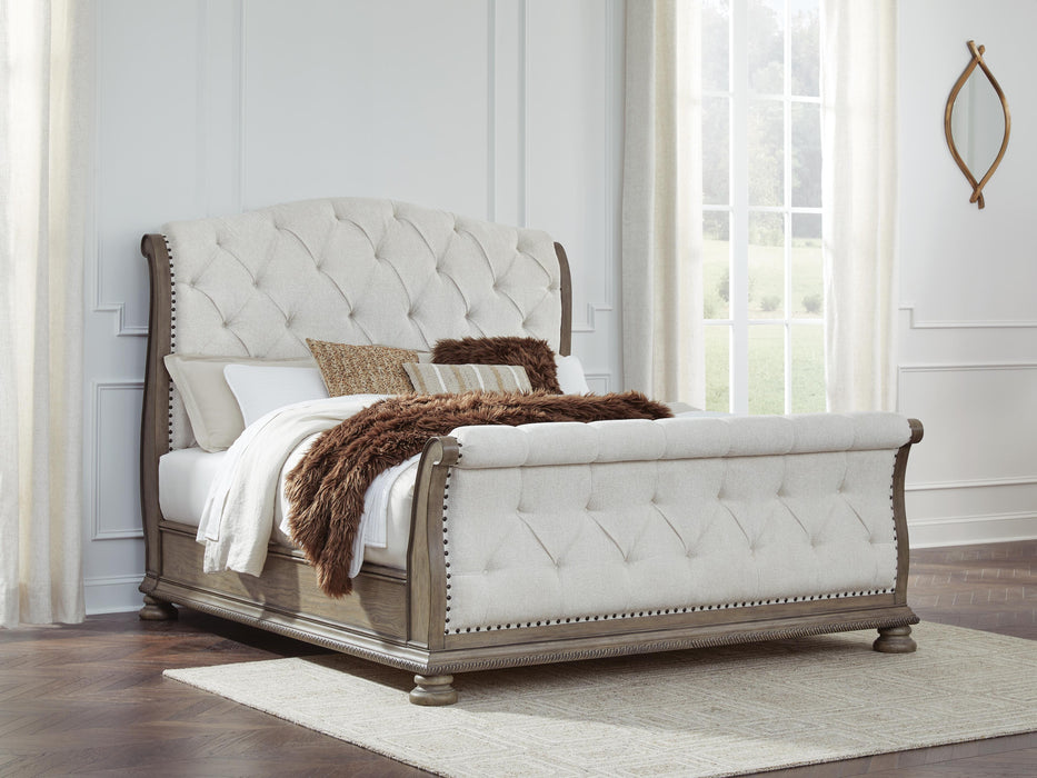 Signature Design Light Brown King Upholstered Sleigh Bed