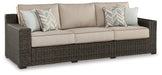 Signature Design Brown Sofa with Cushion