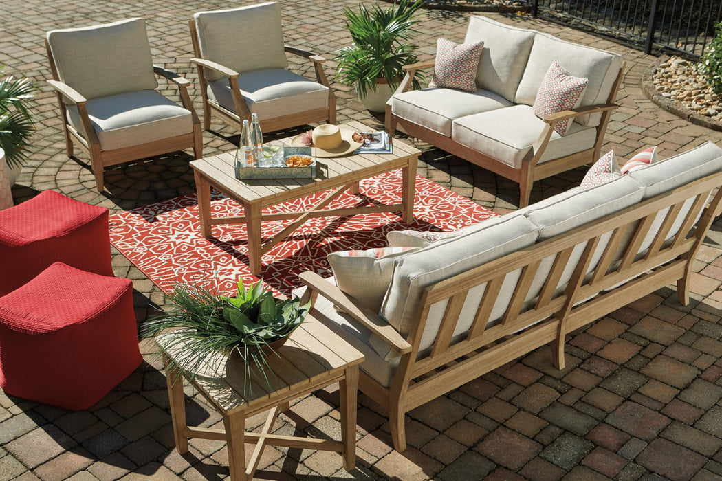 Signature Design Beige Sofa with Cushion