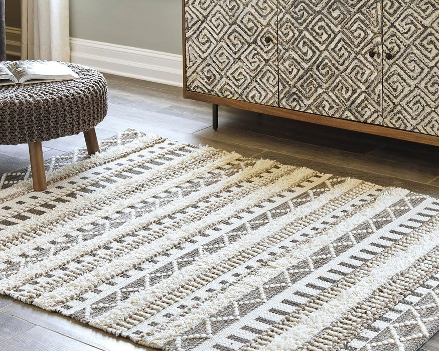 Signature Design Medium Rug 5.22 FT by 6.97 FT