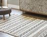 Signature Design Medium Rug 5.22 FT by 6.97 FT