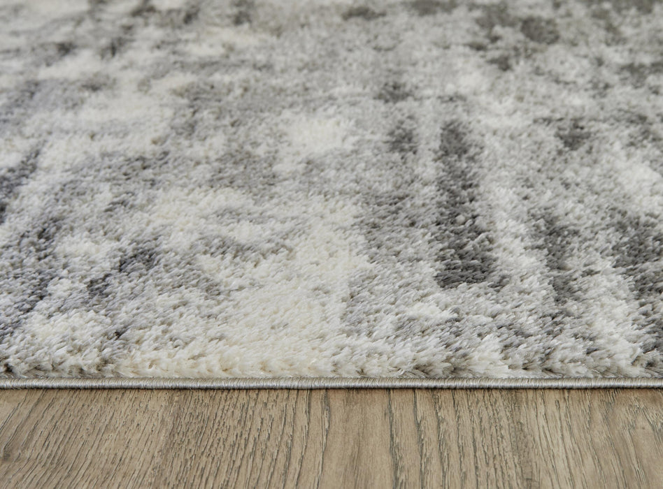 Signature Design Medium Rug 5.25 FT by 7.25 FT