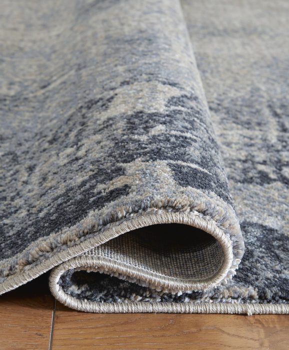 Signature Design Medium Rug 5.27 FT by 7.42 FT