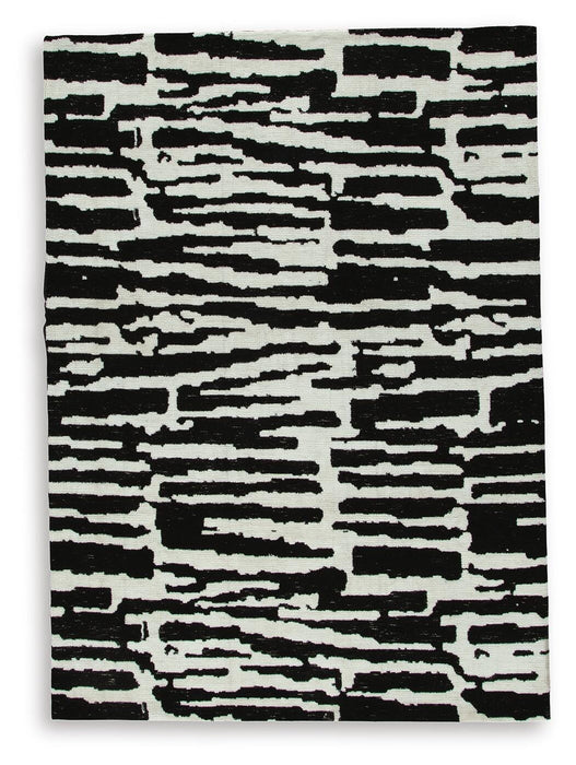 Signature Design Medium Rug 5.19 FT by 6.72 FT