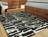 Signature Design Medium Rug 5.19 FT by 6.72 FT