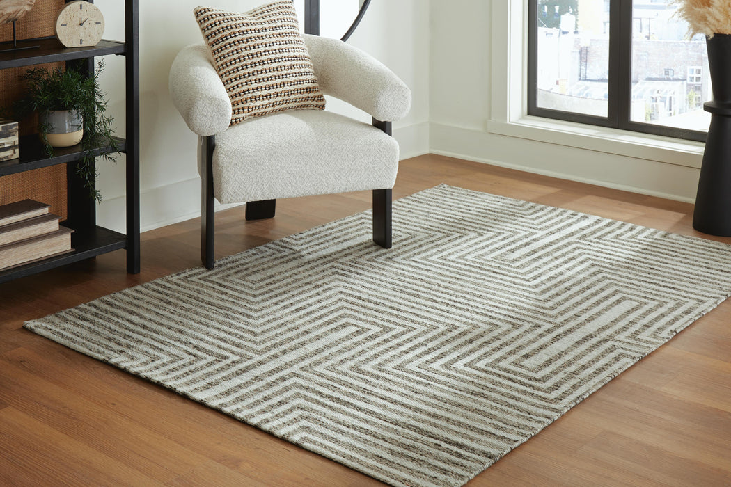 Signature Design Medium Rug 5.09 FT by 7.08 FT