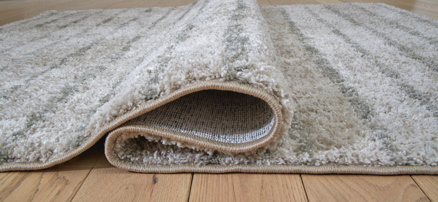 Signature Design Medium Rug 4.85 FT by 6.88 FT
