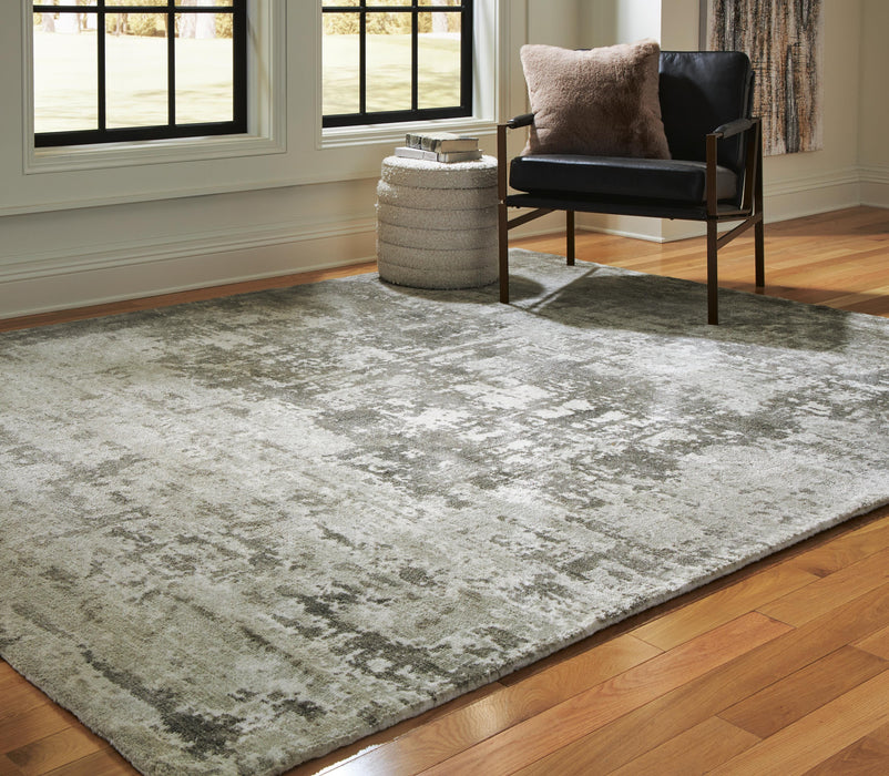 Signature Design Large Rug 7.79 FT by 10.1 FT