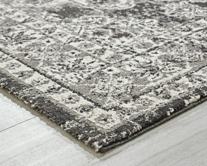 Signature Design Medium Rug 5.28 FT by 7 FT