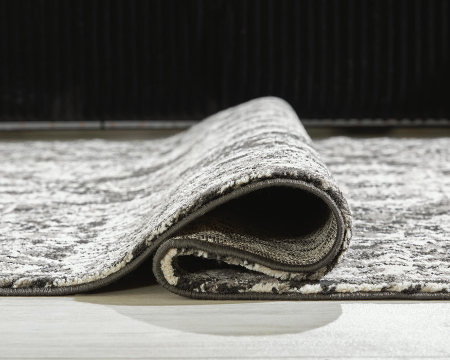 Signature Design Medium Rug 5.28 FT by 7 FT