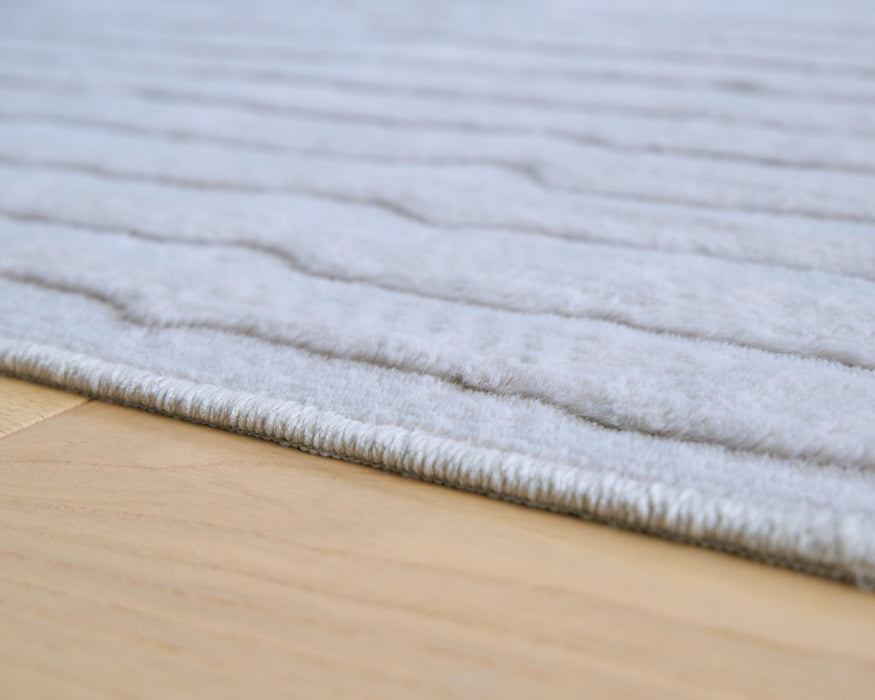 Signature Design Washable Medium Rug 5.04 FT by 6.98 FT