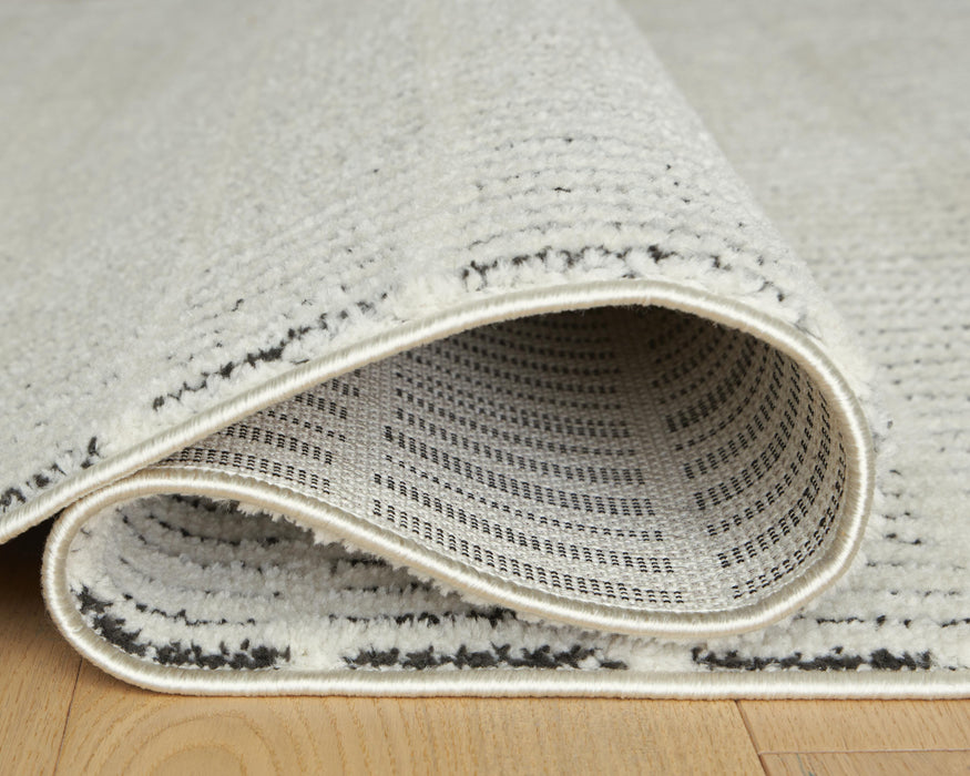 Signature Design Medium Rug 5.33 FT by 7 FT