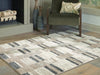 Signature Design Medium Rug 5.26 FT by 7.03 FT