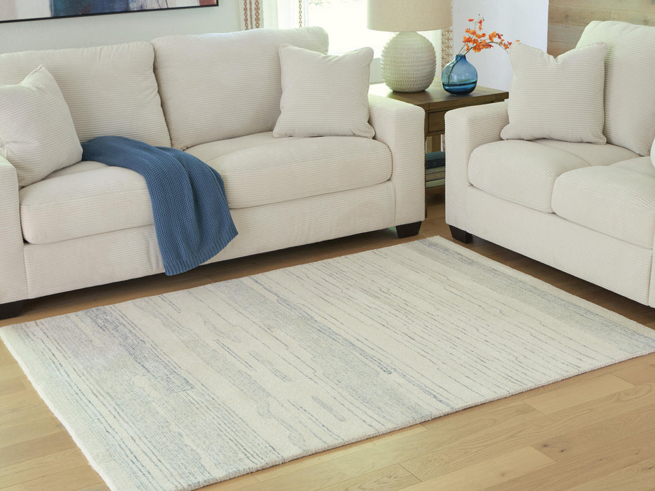 Signature Design Medium Rug 5.06 FT by 6.93 FT