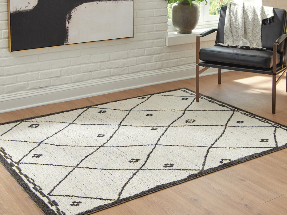 Signature Design Medium Rug 5.27 FT by 7.06 FT