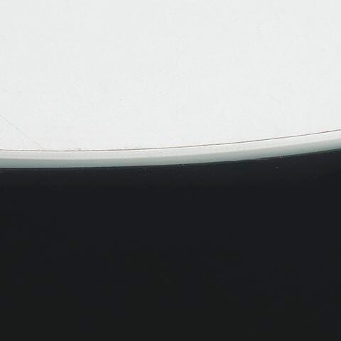Signature Design Black Round End Table