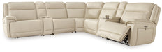 Signature Design Almond 7-Piece Reclining Sectional with 2 Consoles