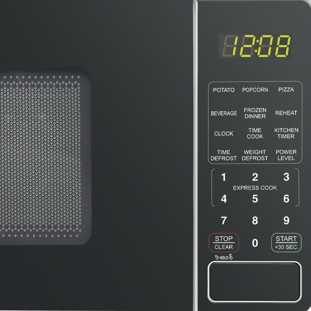 Mainstays 0.7 Cu ft Countertop Microwave Oven, 700 Watts, White, New - open_box