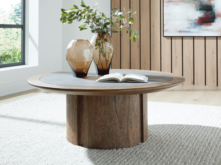 Dontayne Warm Brown Round Cocktail Table