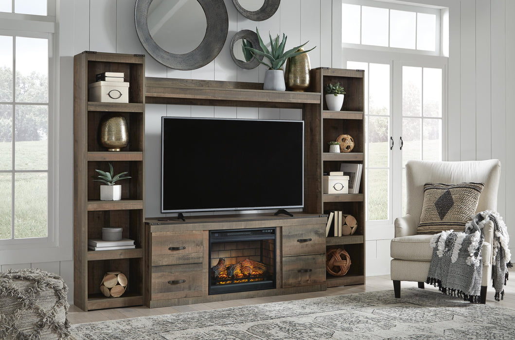 Trinell Brown Trinell 4-Piece Entertainment Center with Electric Fireplace